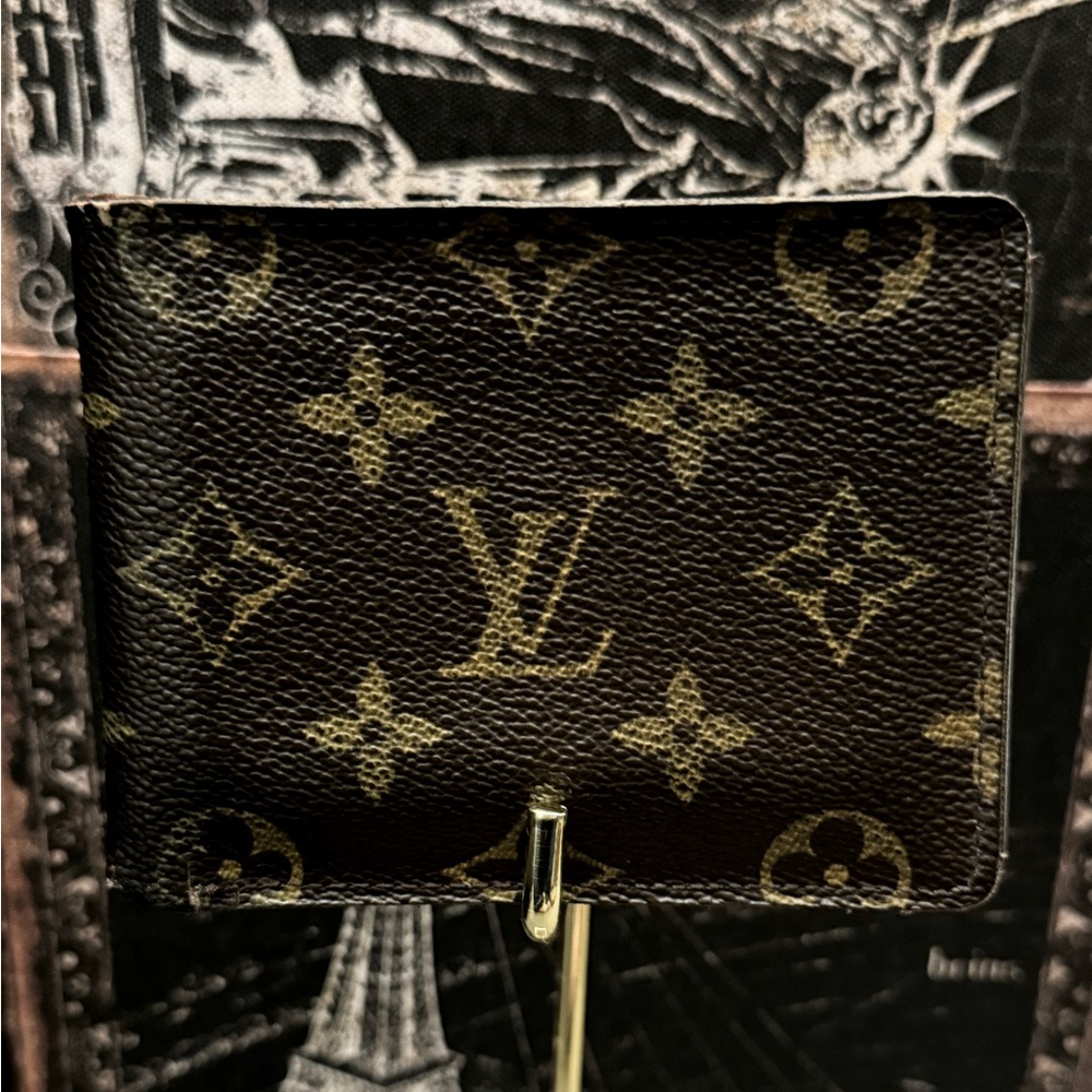 Louis Vuitton men’s multiple monogram wallet.